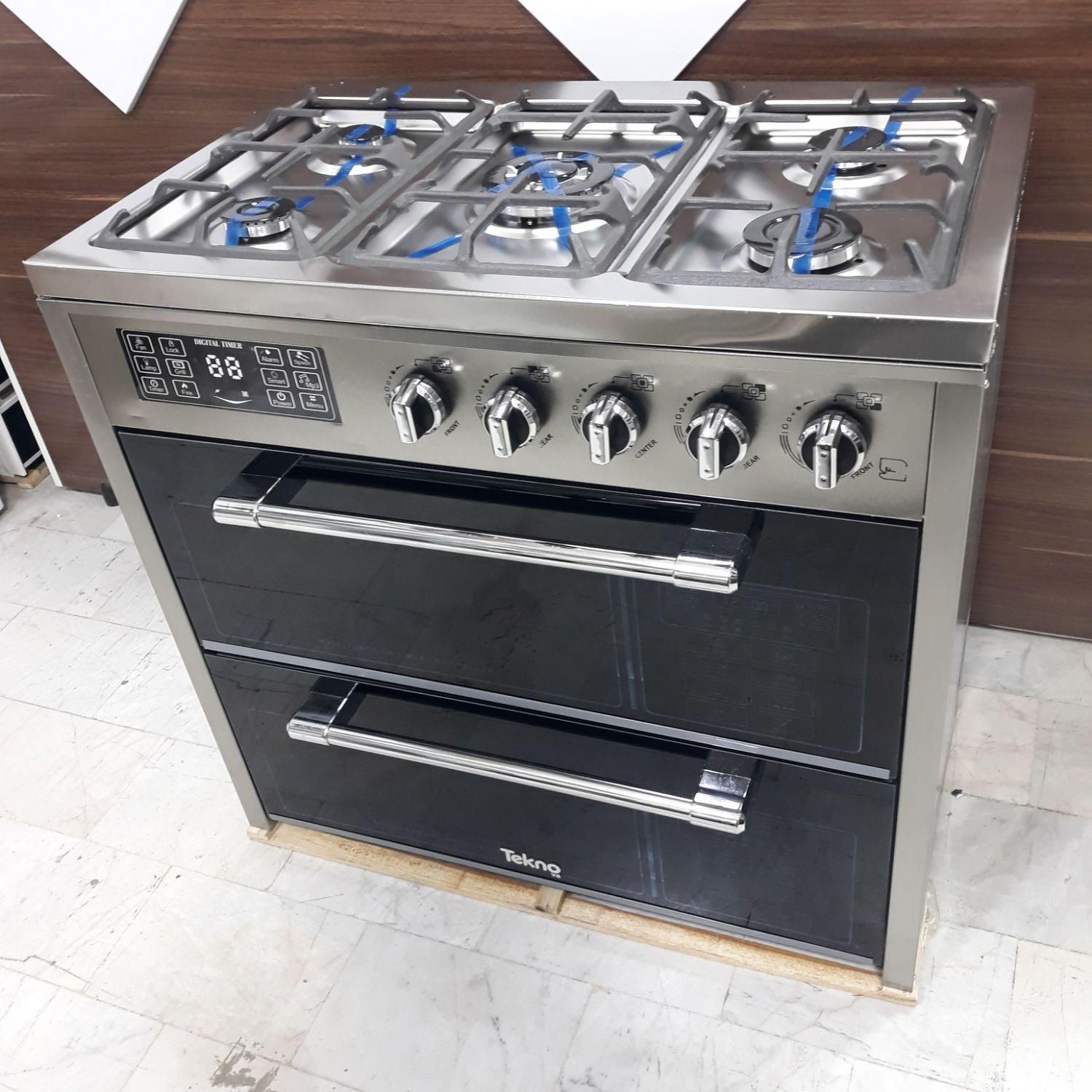 اجاق گاز طرح فر، نما استیل، صفحه استیل،دو درب